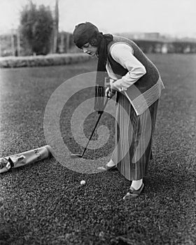 Woman playing golf