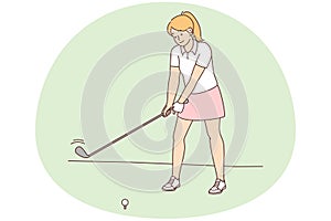 Woman playing golf on field