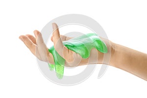 Woman playing with green slime isolated on white. Antistress toy