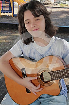 Woman playing guitar