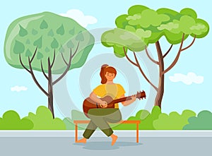 Woman is playing the guitar sitting on the bench. The musician in city park with natural landscape