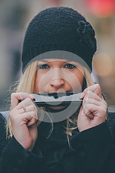 Woman playing harmonica