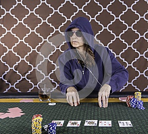 A woman playing poker at a table