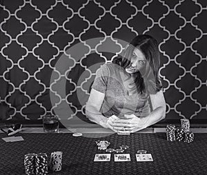 A woman playing poker at a table