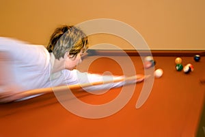 Woman playing pool