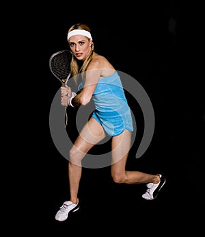 Woman playing raquet ball photo