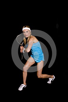 Woman playing raquet ball photo