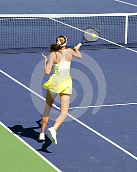 Woman playing tennis