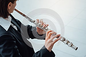 Woman playing transverse flute