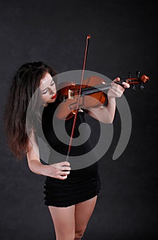 Woman playing violin photo