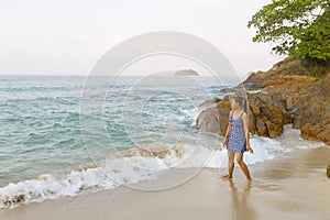 Woman playing wave in morning