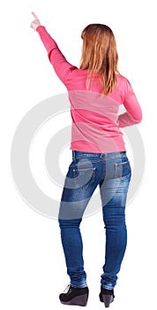 Woman pointing. Back view