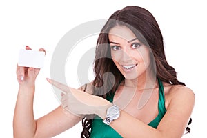 Woman pointing at blank card