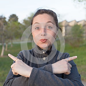 Woman pointing in different directions