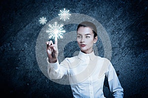 Woman Pointing at Glowing Snow Icon