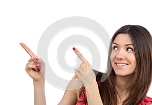 Woman pointing hands finger at corner with copyspace