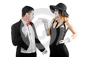 Woman is pointing at man
