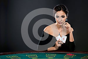 woman with poker cards and chips