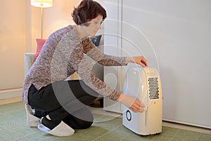 Portable dehumidifier colect water from air