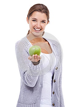 Woman, portrait and apple in hand, nutrition and health with snack, diet for weight loss and clean eating on white