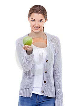 Woman, portrait and apple, nutrition and health with snack or meal, happy with diet for weight loss on white background