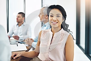 Woman, portrait and business in boardroom with smile for meeting, planning for global sales. Female person, happiness