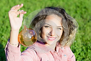 Woman portrait with a Christmas toy.