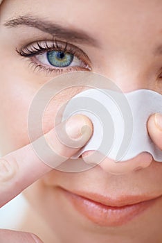 Woman, portrait and closeup of nose strip for skincare, pores and blackhead with smile and cosmetics. Person, face and