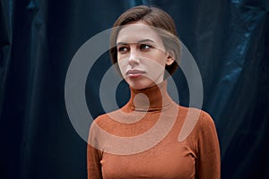 Woman portrait dark background Caucasian female headshoot