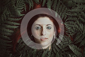 Woman portrait with ferns