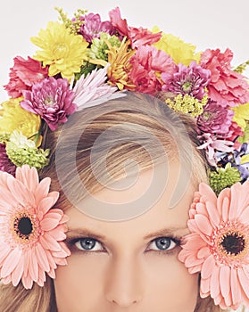 Woman, portrait and flowers on crown for beauty, confidence and wellness with spring aesthetic and floral art. Model