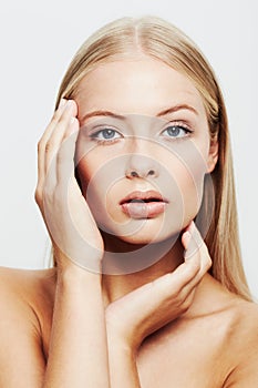 Woman, portrait and hands on skin for beauty, natural cosmetics and glamour on white background. Clean face skincare and