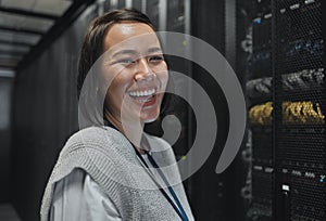 Woman, portrait and happy in server room with information technology, happy in job and datacenter with engineer. Asian