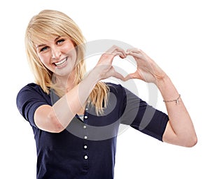 Woman, portrait and heart hands for care in studio, kindness and peace emoji or symbol. Happy female person, support