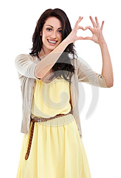 Woman, portrait and heart hands for thank you in studio, kindness and peace emoji or symbol. Happy female person