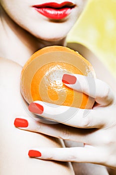 Woman Portrait holding a mandarin orange tangerine