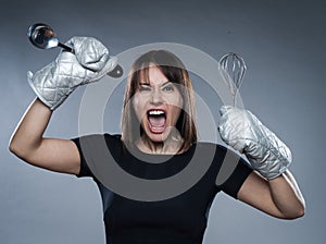 Woman Portrait with kitchen utensils