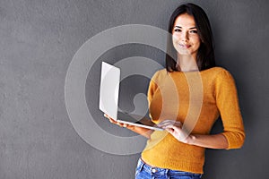 Woman, portrait and laptop with mockup in studio for social media, download or website scroll on black background. Space