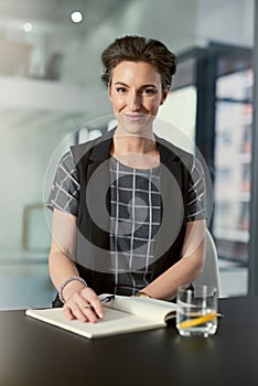 Woman, portrait and office with notebook for creative career as scriptwriter, copywriter and editor for designer company