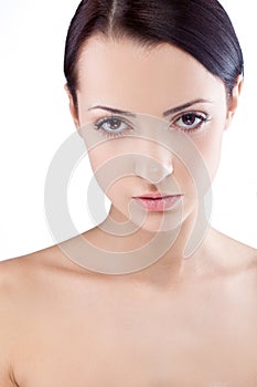 Woman portrait over white with naked clavicles