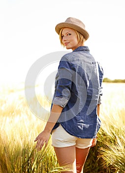 Woman, portrait and peace in outdoor wheat field, spring and relax in sustainable nature. Female person, happy and