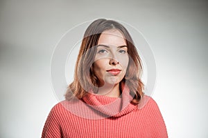 Woman portrait in pink sweater