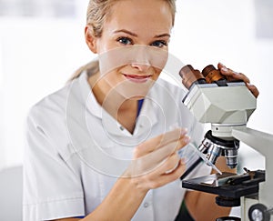 Woman, portrait and rmedical research scientist with microscope for exam or scientific discovery at laboratory. Face of