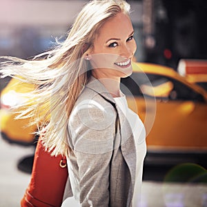 Woman, portrait and smile with urban, walk and commute for work or career. Designer, job and new york street with city