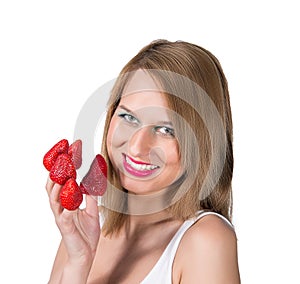 Woman portrait and strawberry on a her fingers