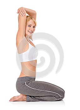 Woman, portrait and stretching with yoga in studio for exercise, healthy body or wellness and fitness or smile. Pilates