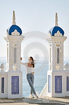 Woman pose in Balcon del Mediterraneo. Benidorm. Spain photo