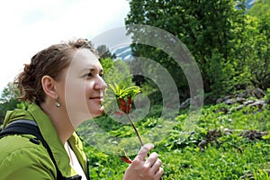 Woman posing with Acer platanoides on Lago-Naki Plateau