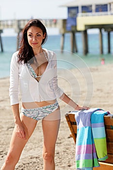 Woman posing on the beach