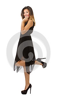 Woman posing with black dress lateral view